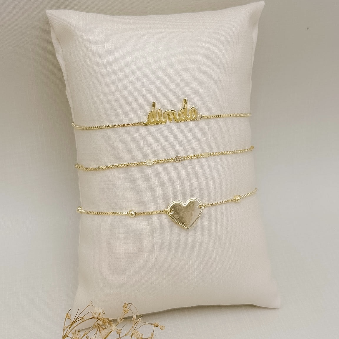 12.2308.0.O - Pulseira de veneziana com bolinhas com central de coração em placa lisa