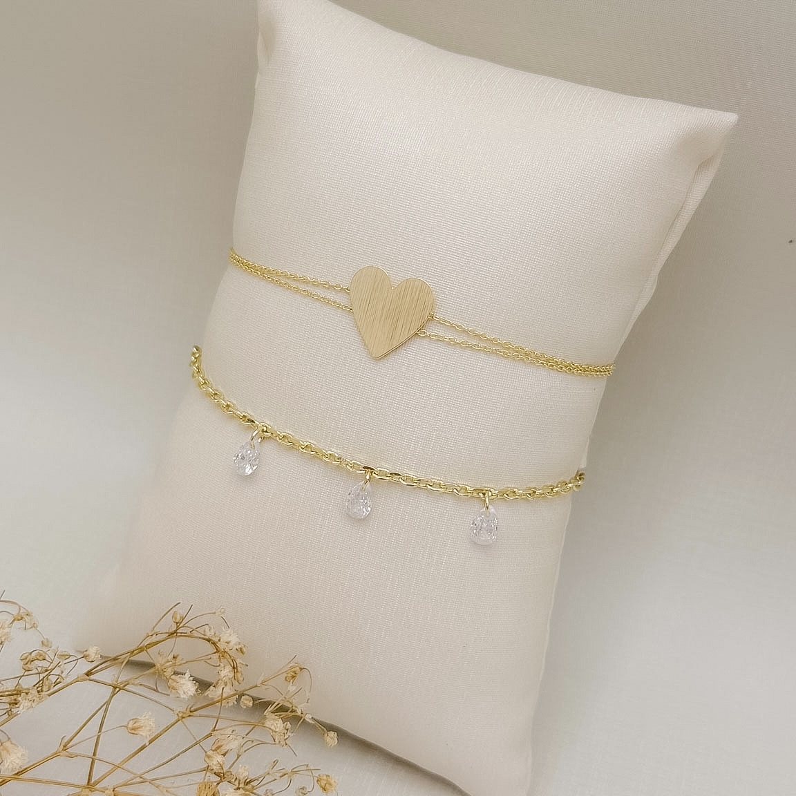 12.2312.0.O - Pulseira dupla de elos americanos com coração liso central