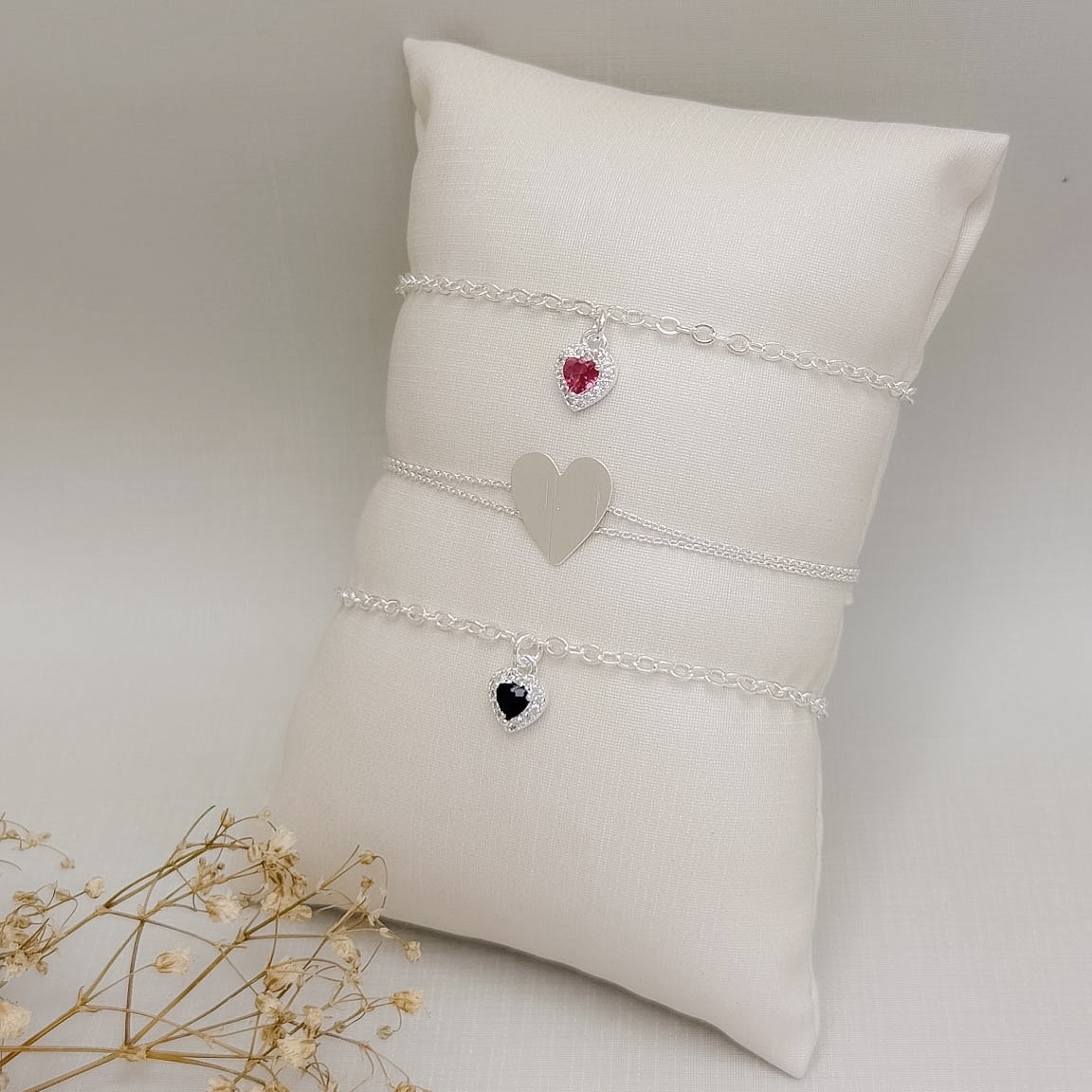 12.2312.0.S - Pulseira dupla de elos americanos com coração liso central