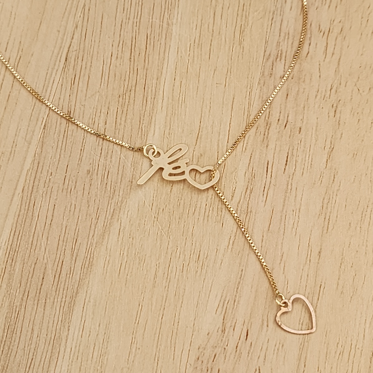 COLAR DOURADO GRAVATINHA FÉ CORAÇÃO VAZADO