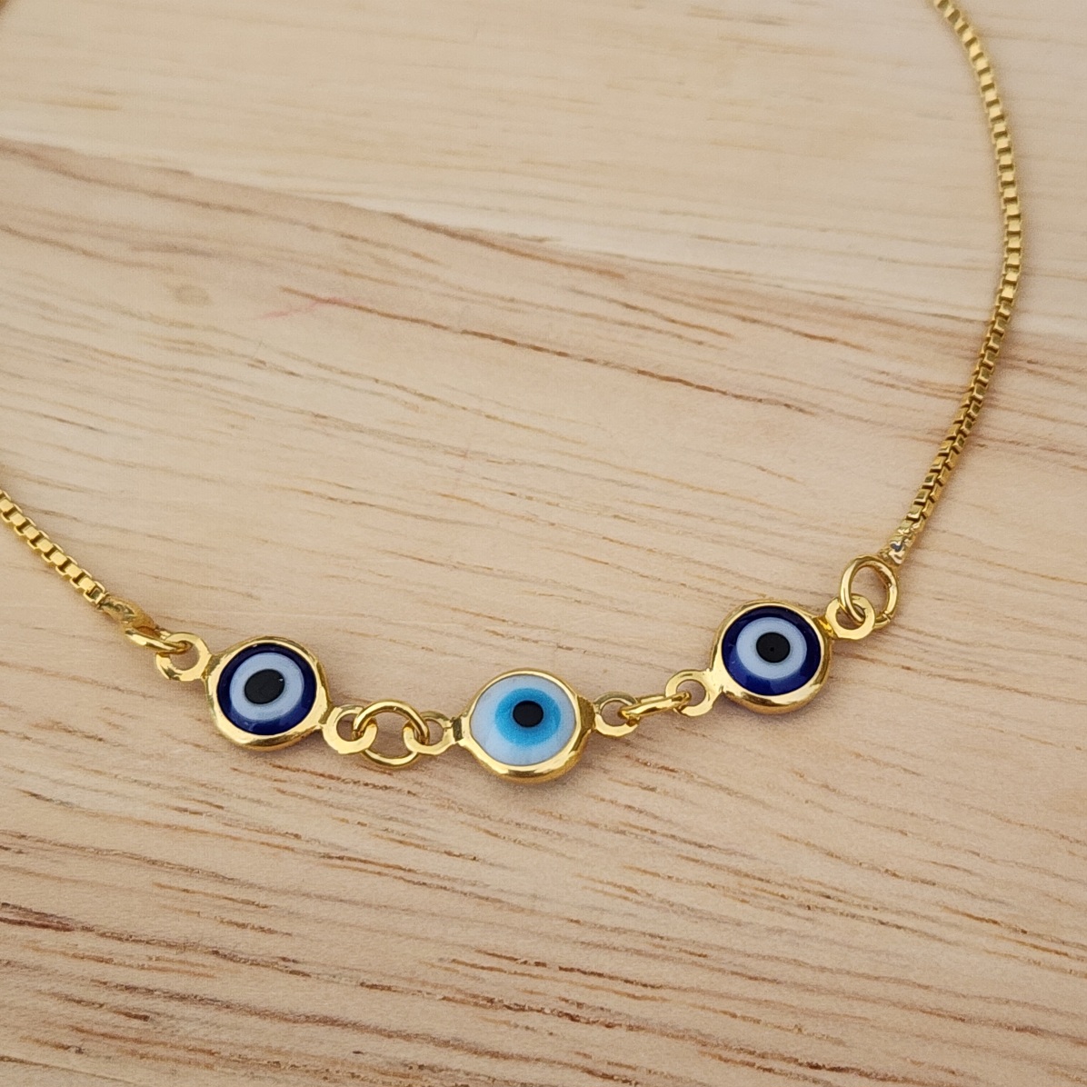 PULSEIRA DOURADA OLHO GREGO