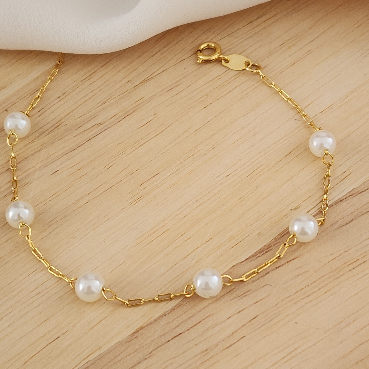 PULSEIRA DOURADA PÉROLAS MÉDIAS