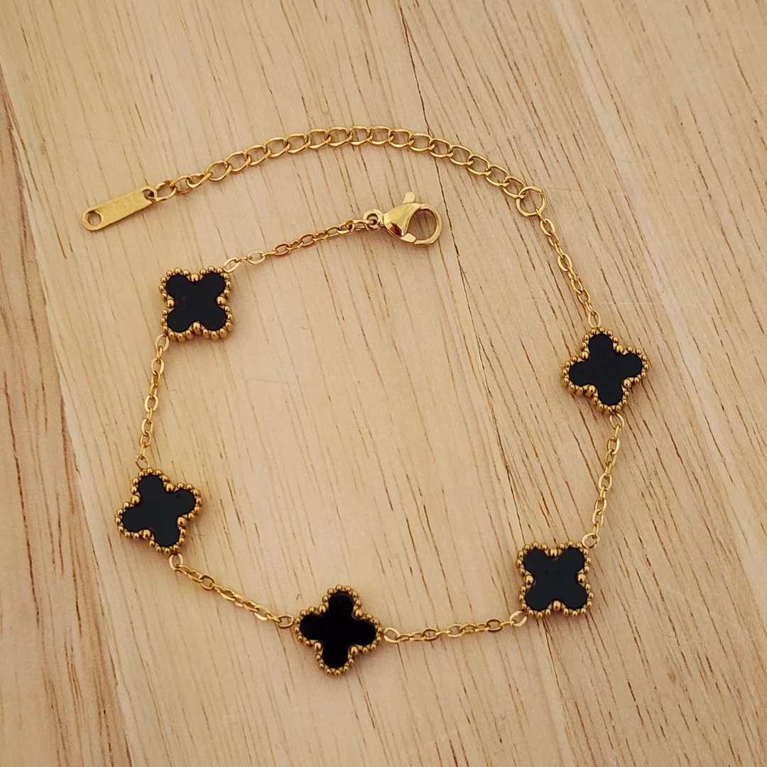 PULSEIRA AÇO DOURADA CINCO TREVOS PRETO M