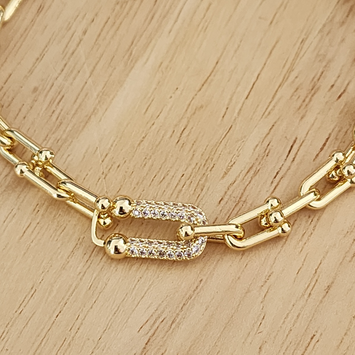 PULSEIRAS ELOS COM DETALHE CRAVEJADO DOURADO