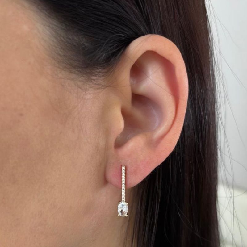 BRINCO PALITO CRAVEJADO COM PEDRA OVAL NA PONTA