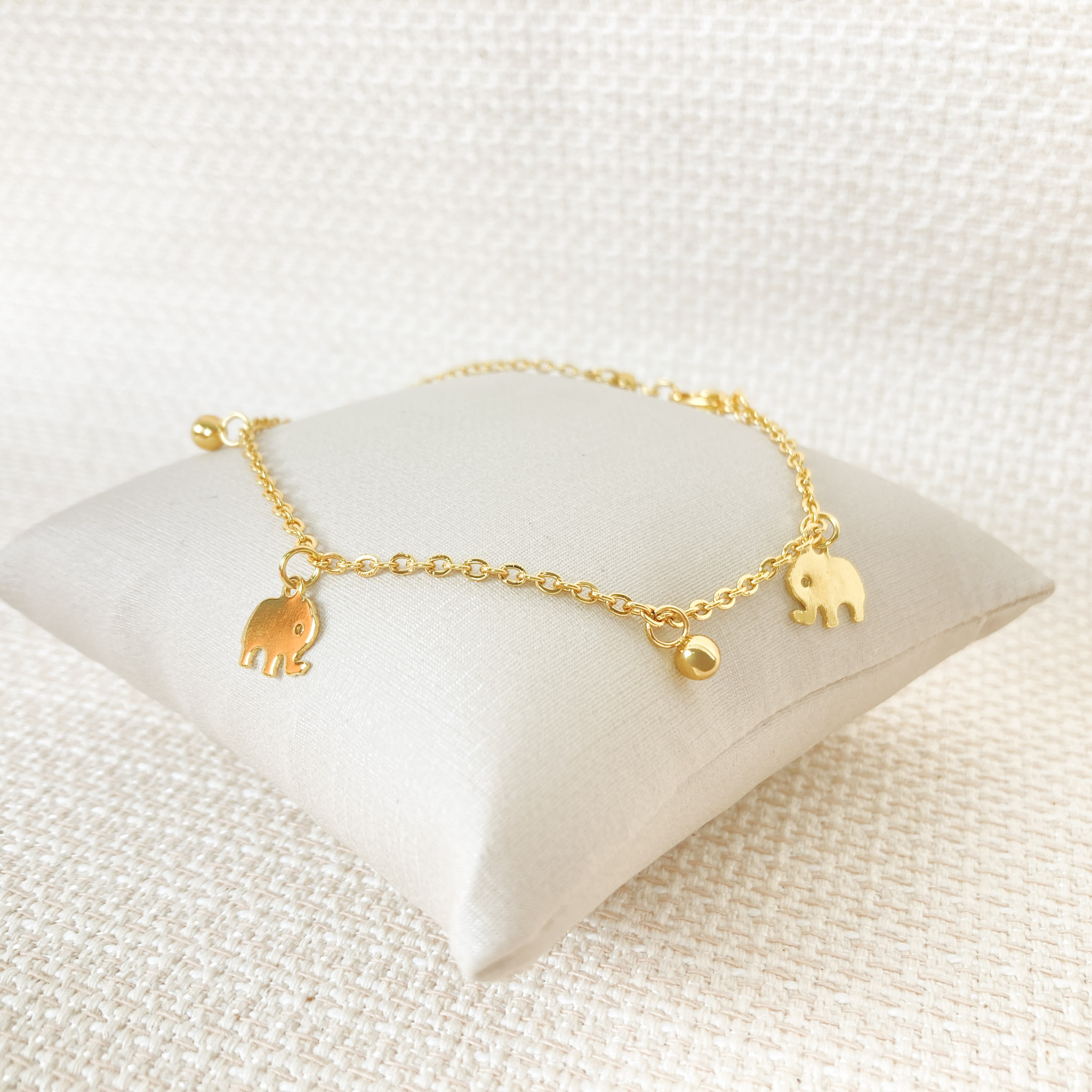 Tornozeleira Pingente Bolinha e Elefante em Aço Inox Dourado