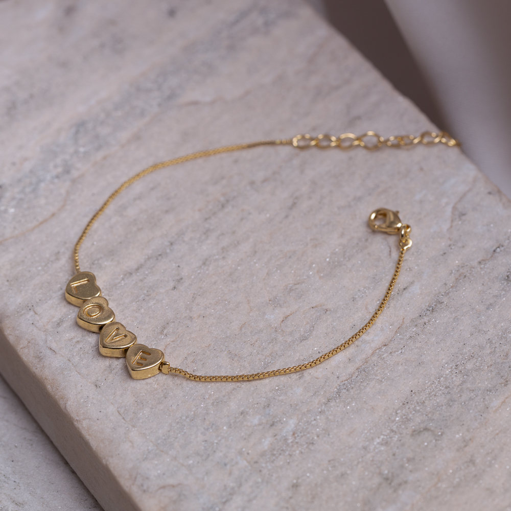 PULSEIRA CORAÇÕES E LOVE BANHO OURO 18K