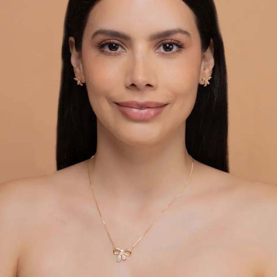 CONJUNTO LAÇO COM ZIRCÔNIAS CRISTAIS BANHO OURO 18K
