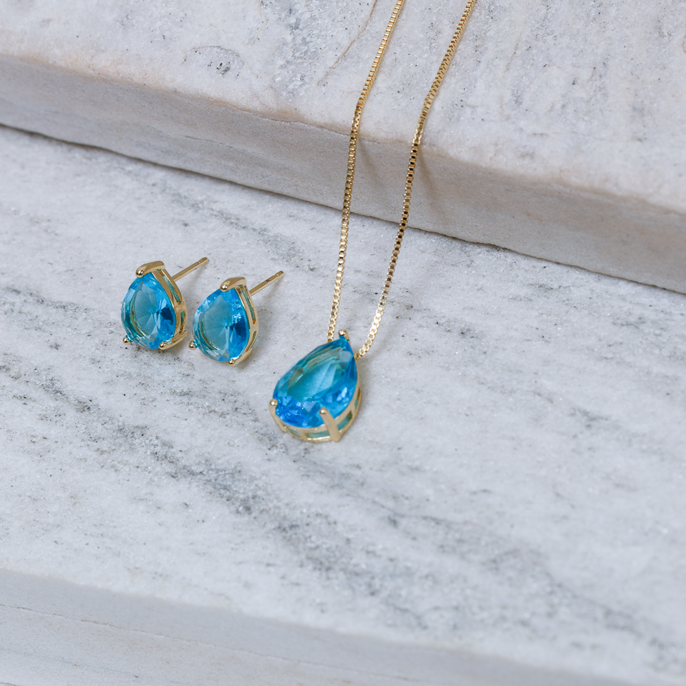 CONJUNTO GOTA COM PEDRA AZUL CLARO BANHO OURO 18K