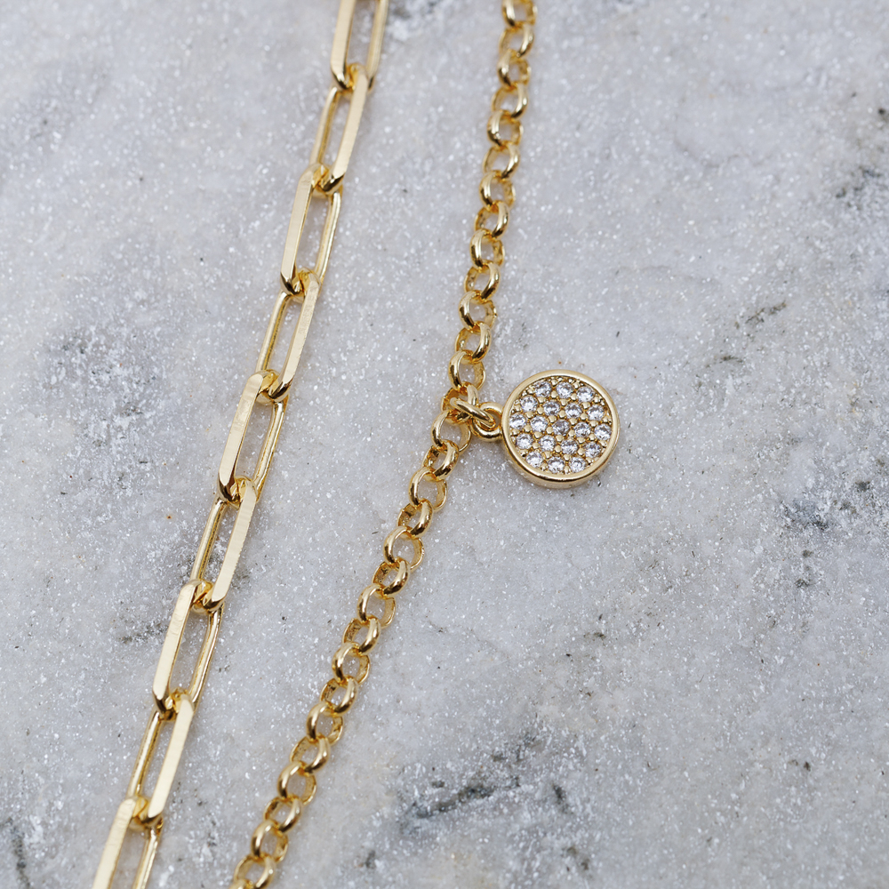 PULSEIRA CORRENTE DUPLA COM CÍRCULO CRAVEJADO BANHO OURO 18K