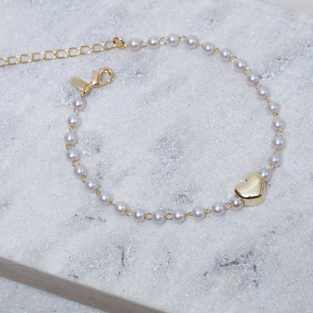 PULSEIRA PÉROLA COM CORAÇÃO LISO BANHO OURO 18K