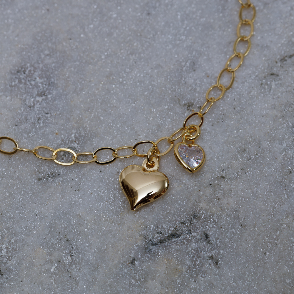 PULSEIRA DOIS CORAÇÕES BANHO OURO 18K