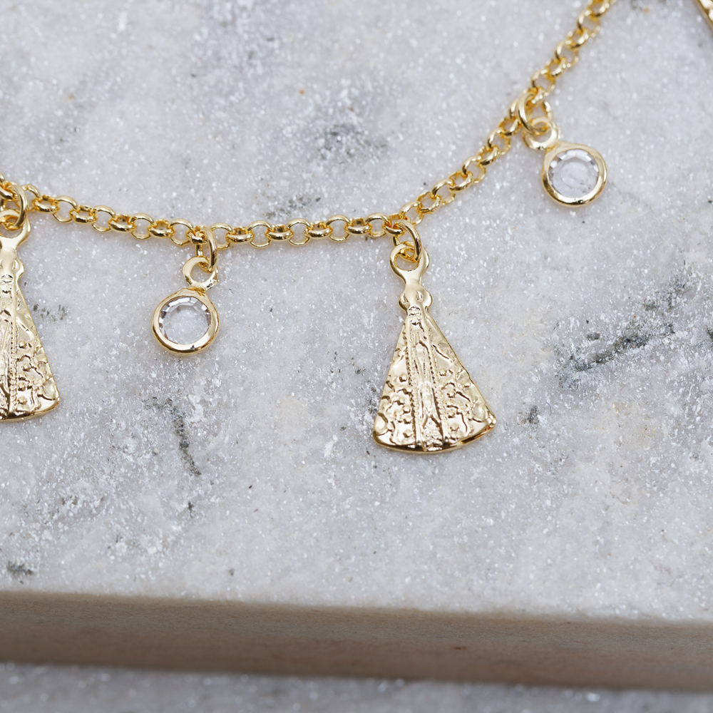 PULSEIRA NOSSA SENHORA COM CRISTAIS BANHO OURO 18K