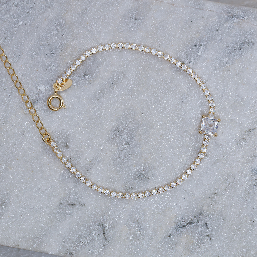 PULSEIRA RIVIERA P CRISTAL BANHO OURO 18K