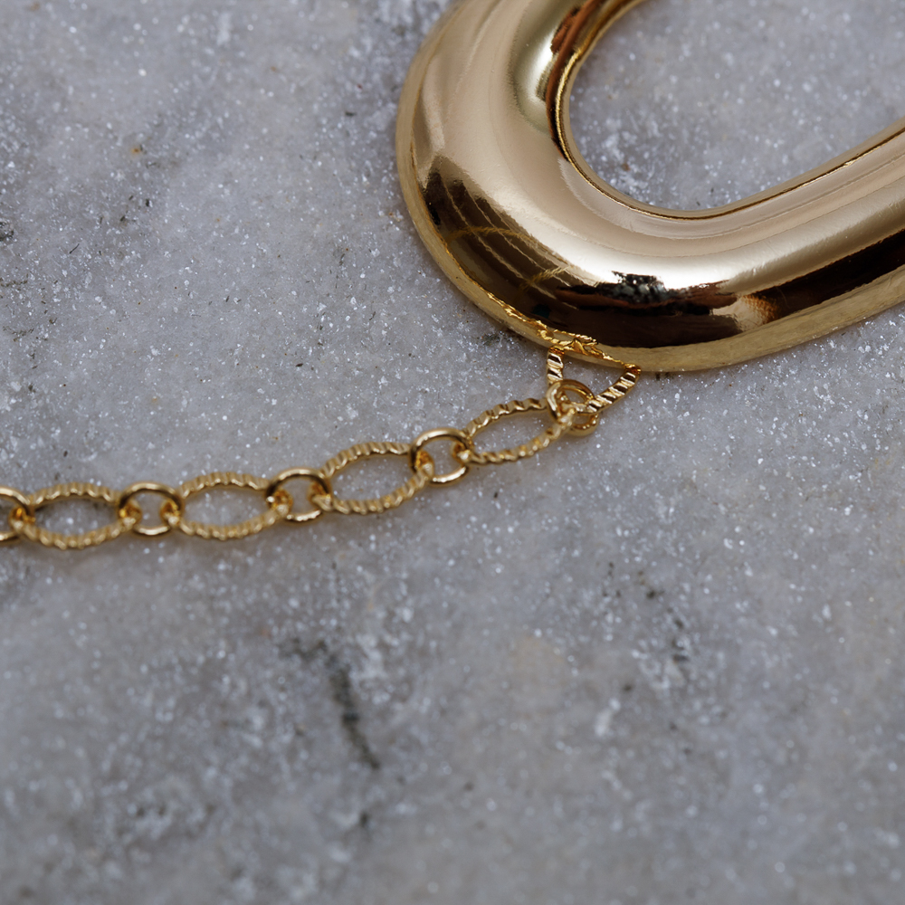 PULSEIRA ELOS COM CORAÇÃO VAZADO BANHO OURO 18K