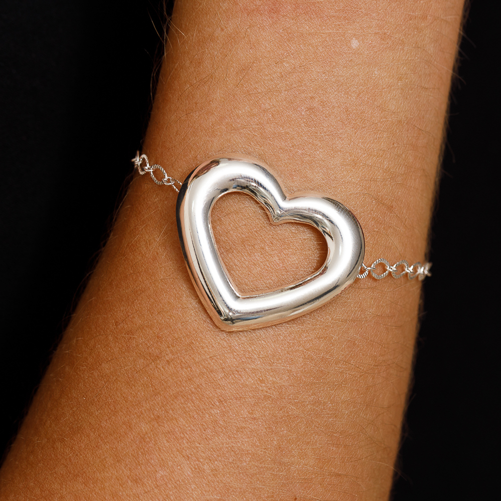 PULSEIRA ELOS COM CORAÇÃO VAZADO BANHO PRATA