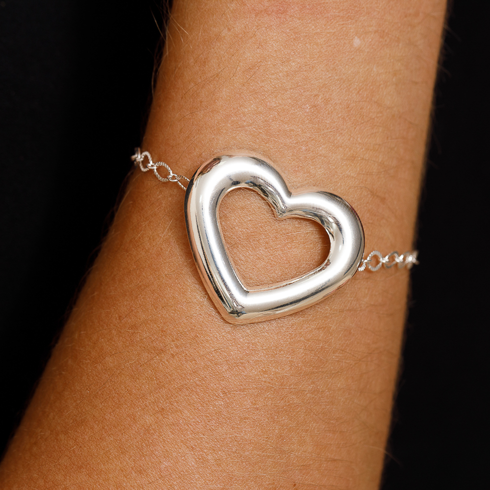 PULSEIRA ELOS COM CORAÇÃO VAZADO BANHO PRATA