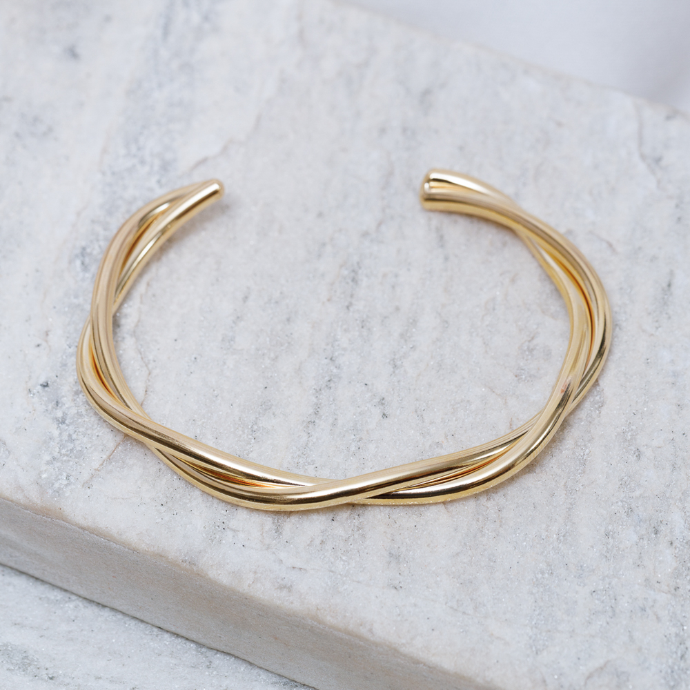 BRACELETE GROSSO TORCIDO BANHO OURO 18K