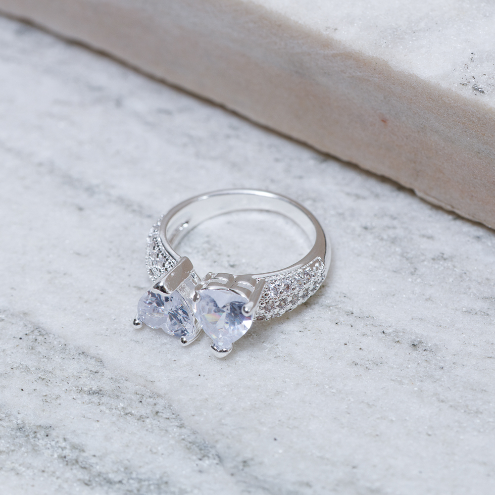 ANEL CORAÇÃO DUPLO PEDRA CRISTAL BANHO PRATA