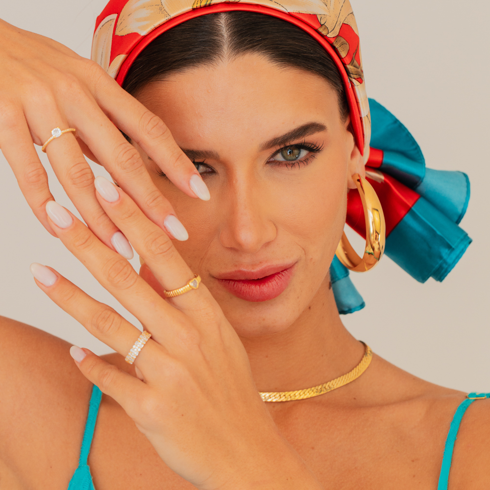 ANEL ZIRCÔNIAS TRIPLAS CRISTAL BANHO OURO 18K