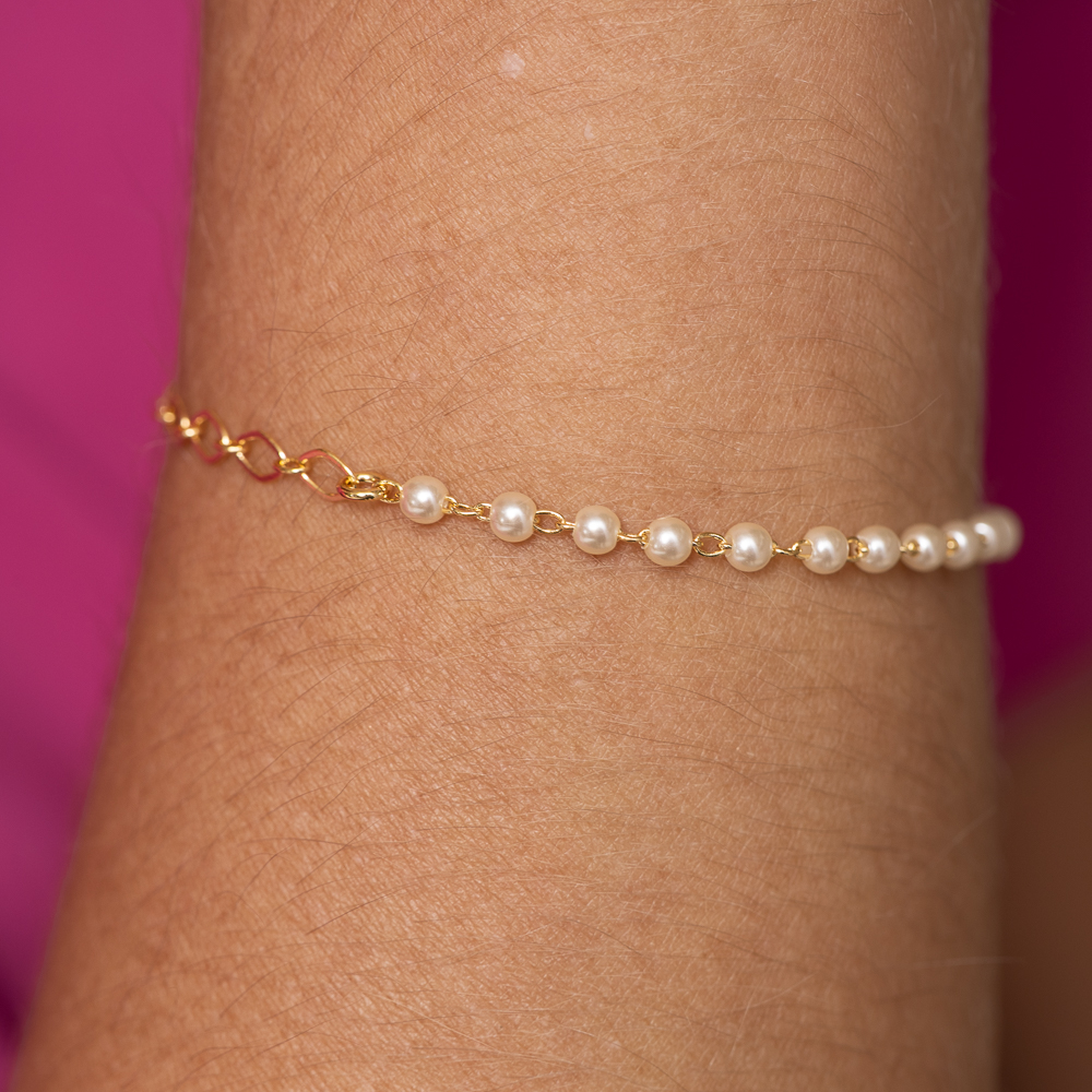 PULSEIRA PÉROLA COM PINGENTES DO MAR BANHO OURO 18K
