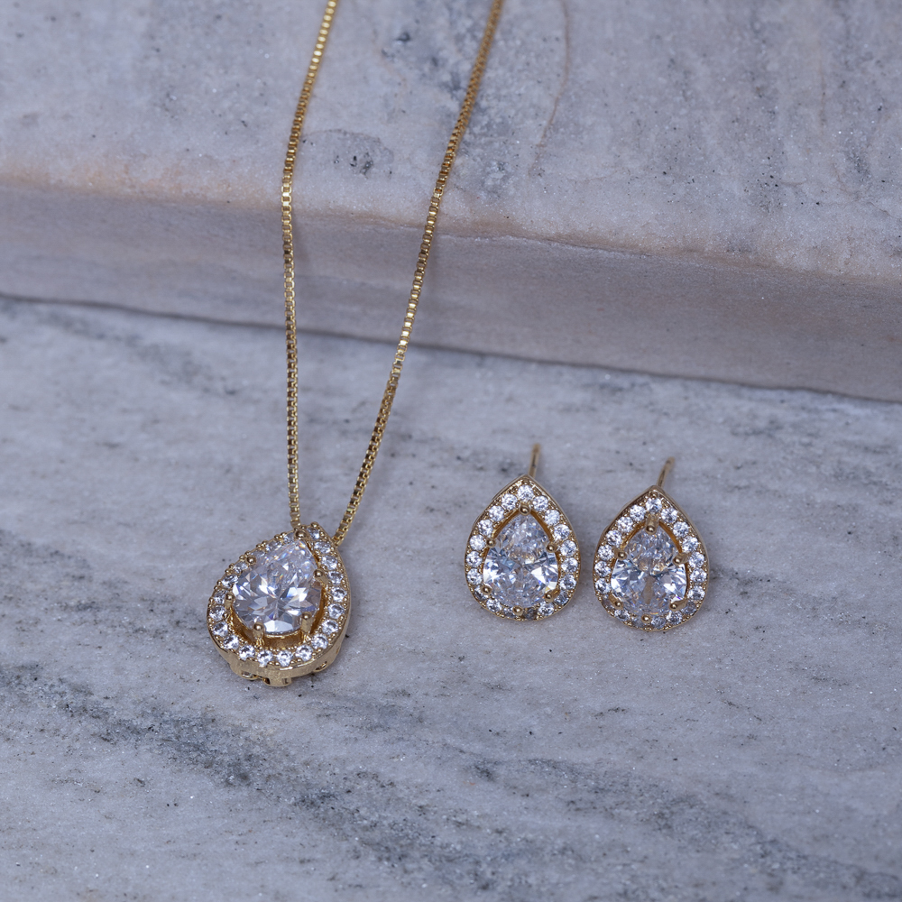 CONJUNTO GOTA CRISTAL E CRAVEJADA BANHO OURO 18K