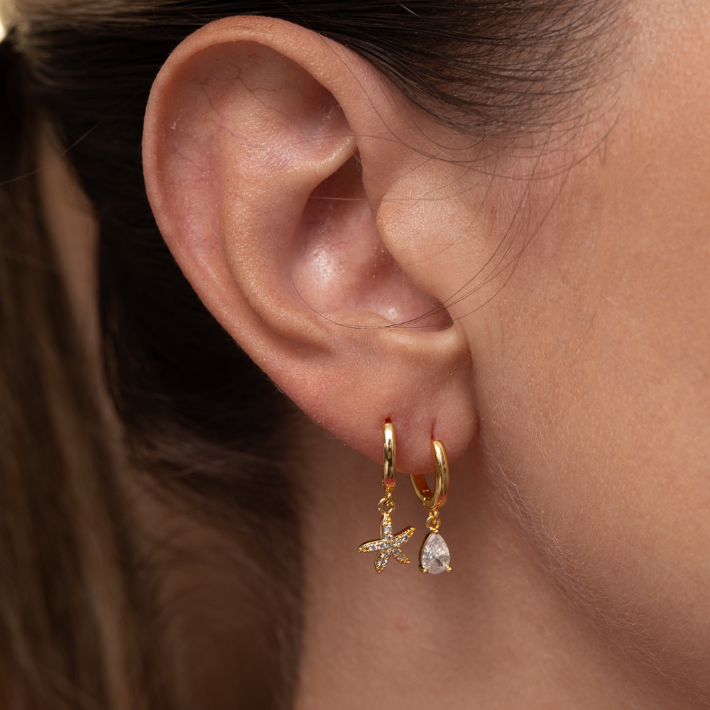 BRINCO ARGOLINHA COM PINGENTE GOTINHA CRISTAL BANHO OURO 18K