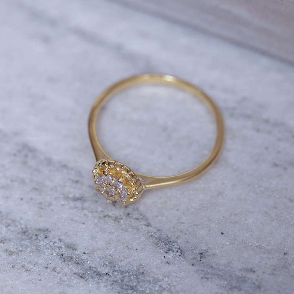 ANEL FLORZINHA COM PEDRINHA CRISTAL BANHO OURO 18K
