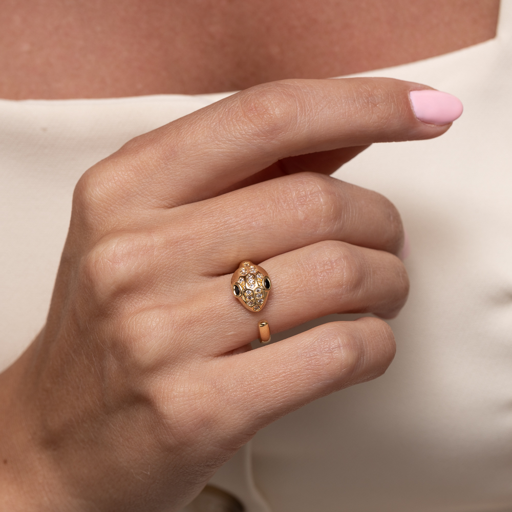 ANEL COBRA CRAVEJADA COM OLHOS NEGROS BANHO OURO 18K