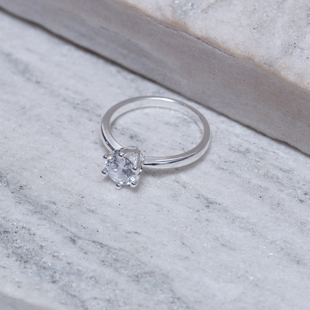 ANEL SOLITÁRIO 6 GARRAS BANHO PRATA