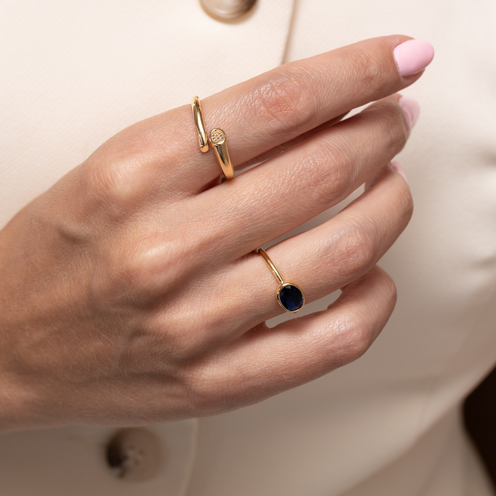 ANEL REGULÁVEL COM ZIRCÔNIAS NA PONTA BANHO OURO 18K