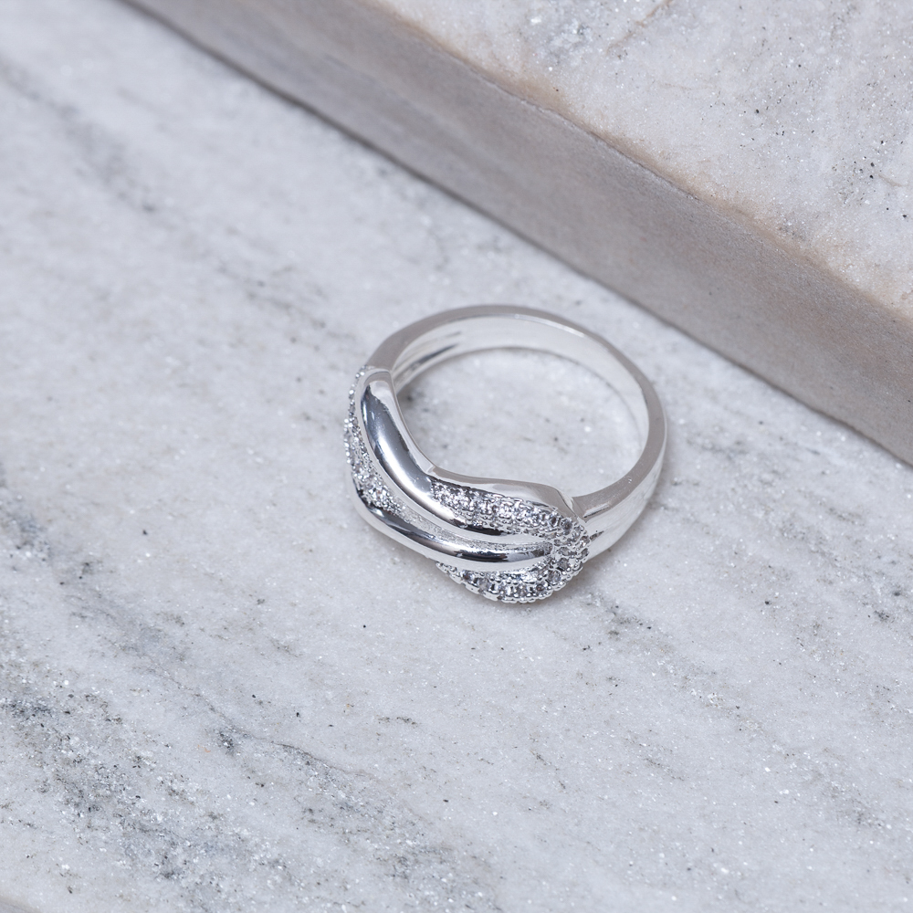 ANEL NÓ LUXO CRAVEJADO COM ZIRCÔNIAS BANHO PRATA