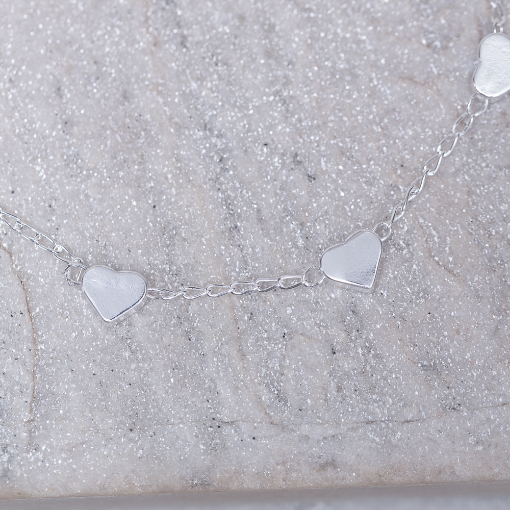 PULSEIRA CORAÇÕES LISOS BANHO PRATA