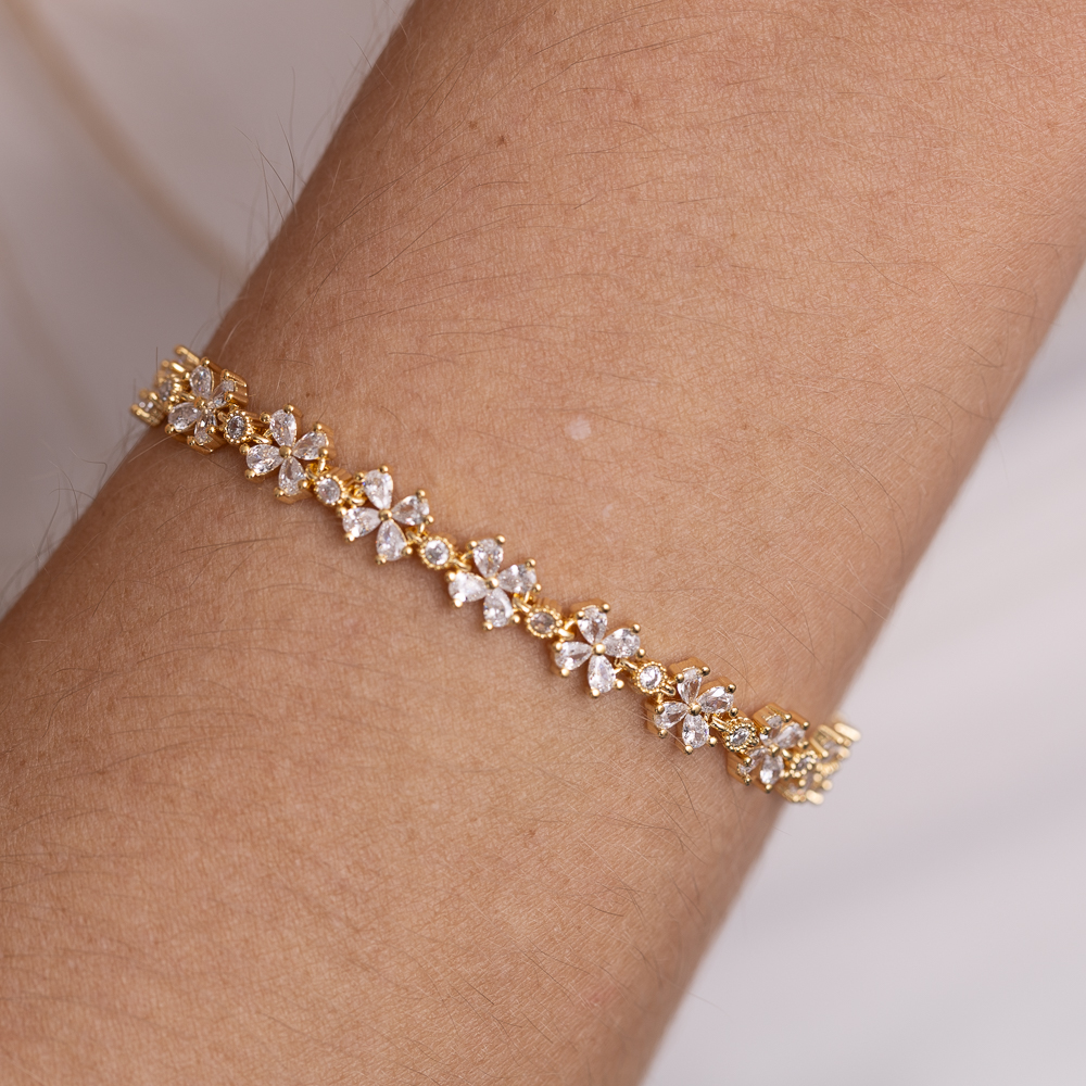 PULSEIRA FLORZINHA RIVIERA CRISTAL BANHO OURO 18K