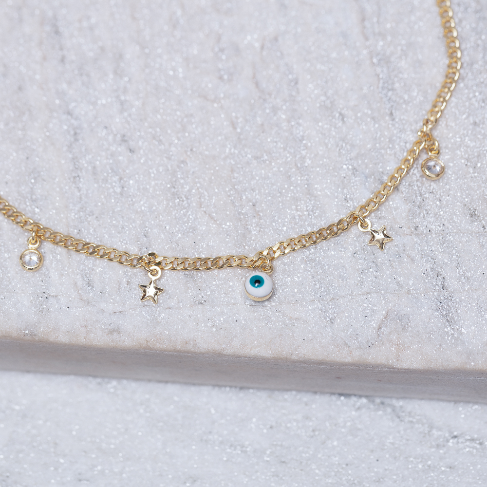 TORNOZELEIRA OLHO GREGO, CRISTAL E ESTRELINHA BANHO OURO 18K