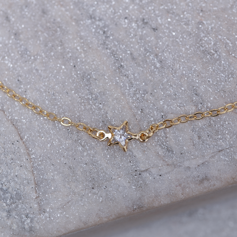 TORNOZELEIRA ESTRELINHAS CRISTAIS BANHO OURO 18K