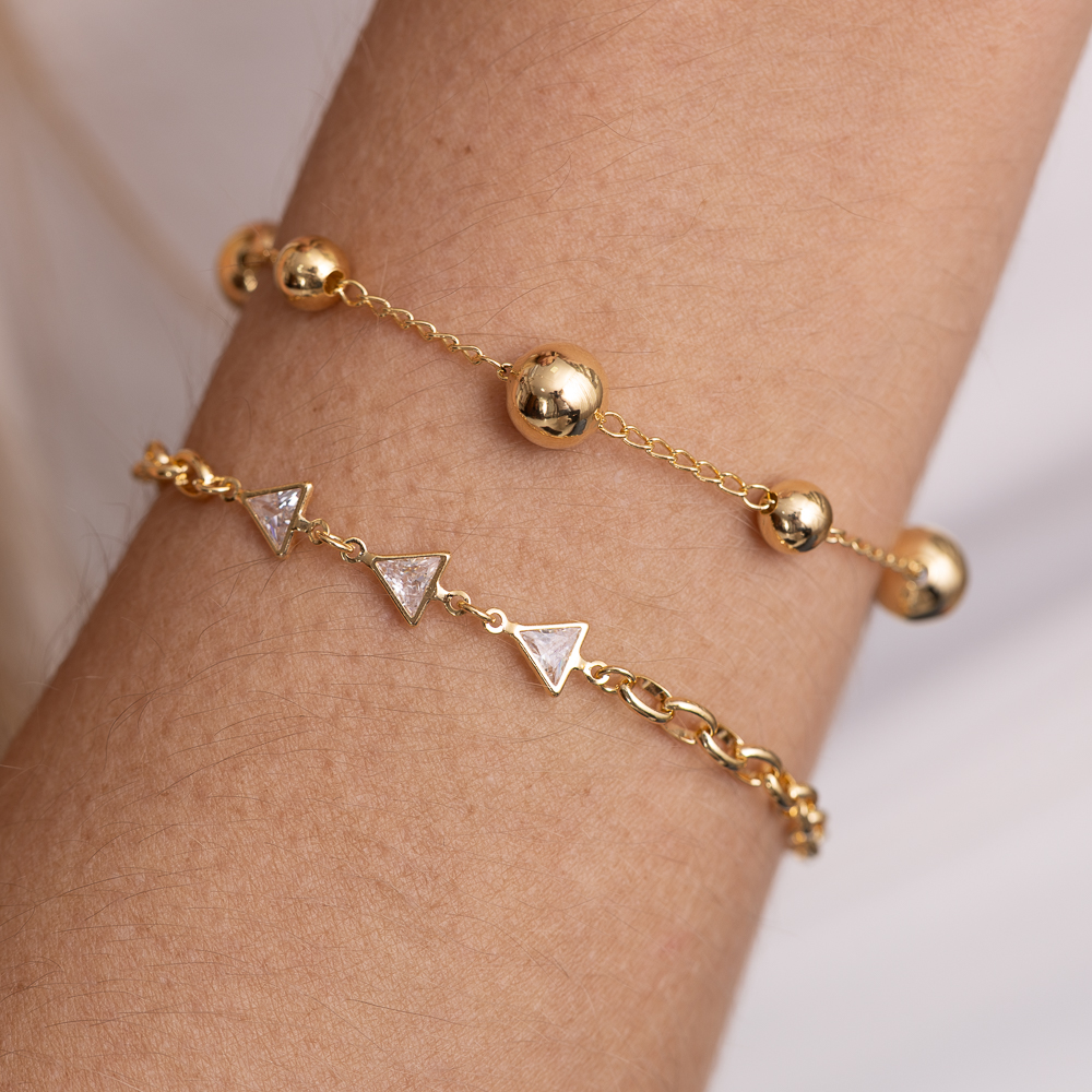 PULSEIRA BOLINHAS G LISAS BANHO OURO 18K