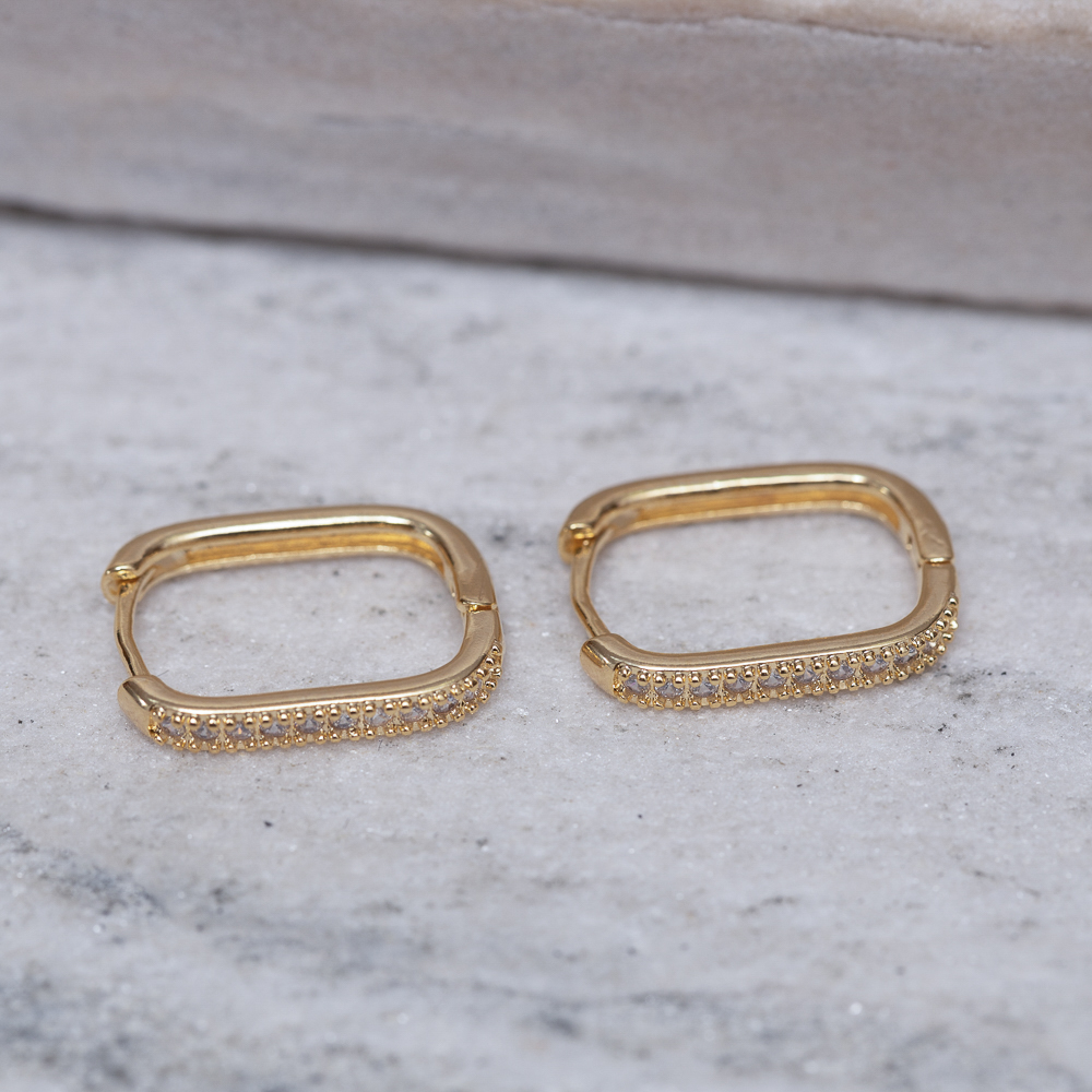 BRINCO ARGOLA OVAL CRAVEJADA M BANHO OURO 18K