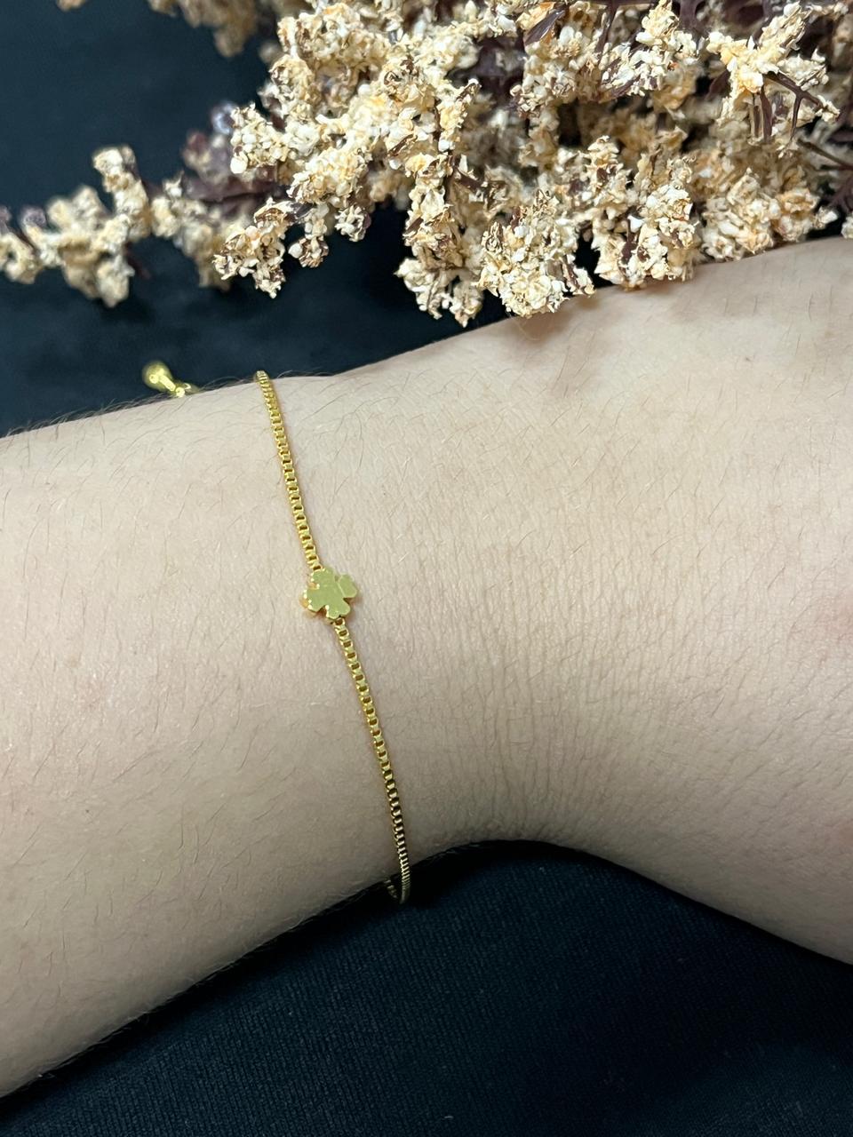 Pulseira flor dourada