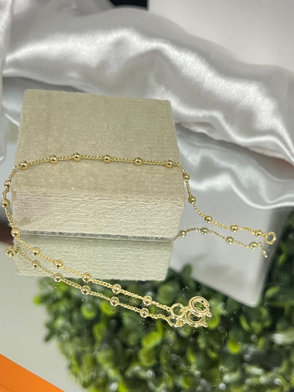 Pulseira com bolinhas
