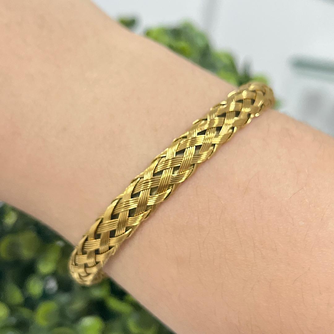 Bracelete de aço dourado