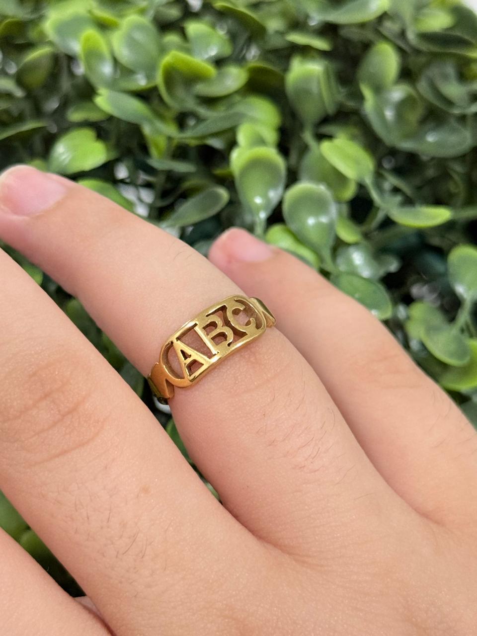 Anel ABC infantil de aço dourado