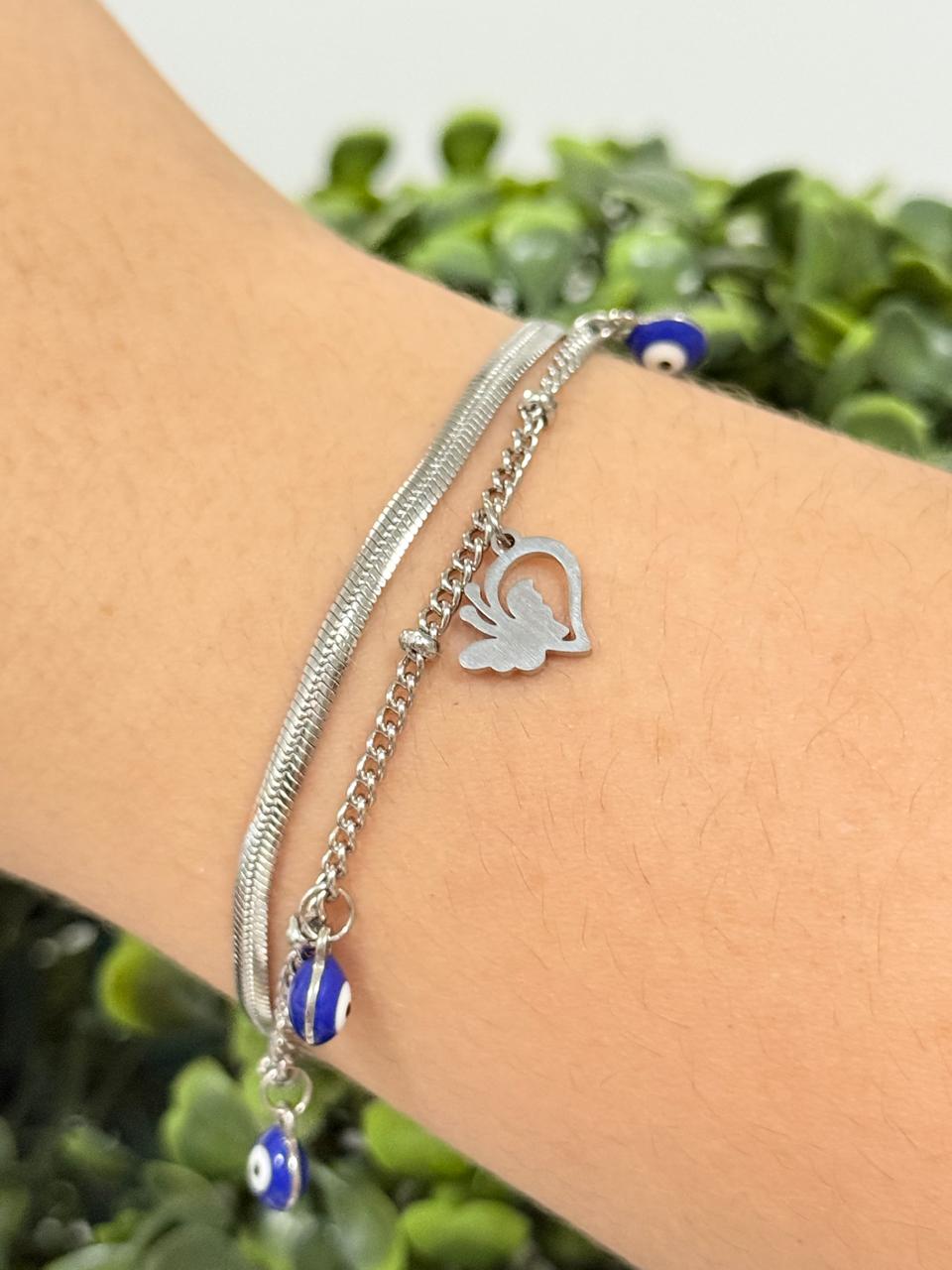 Pulseira dupla com pingente coração e olho grego de aço