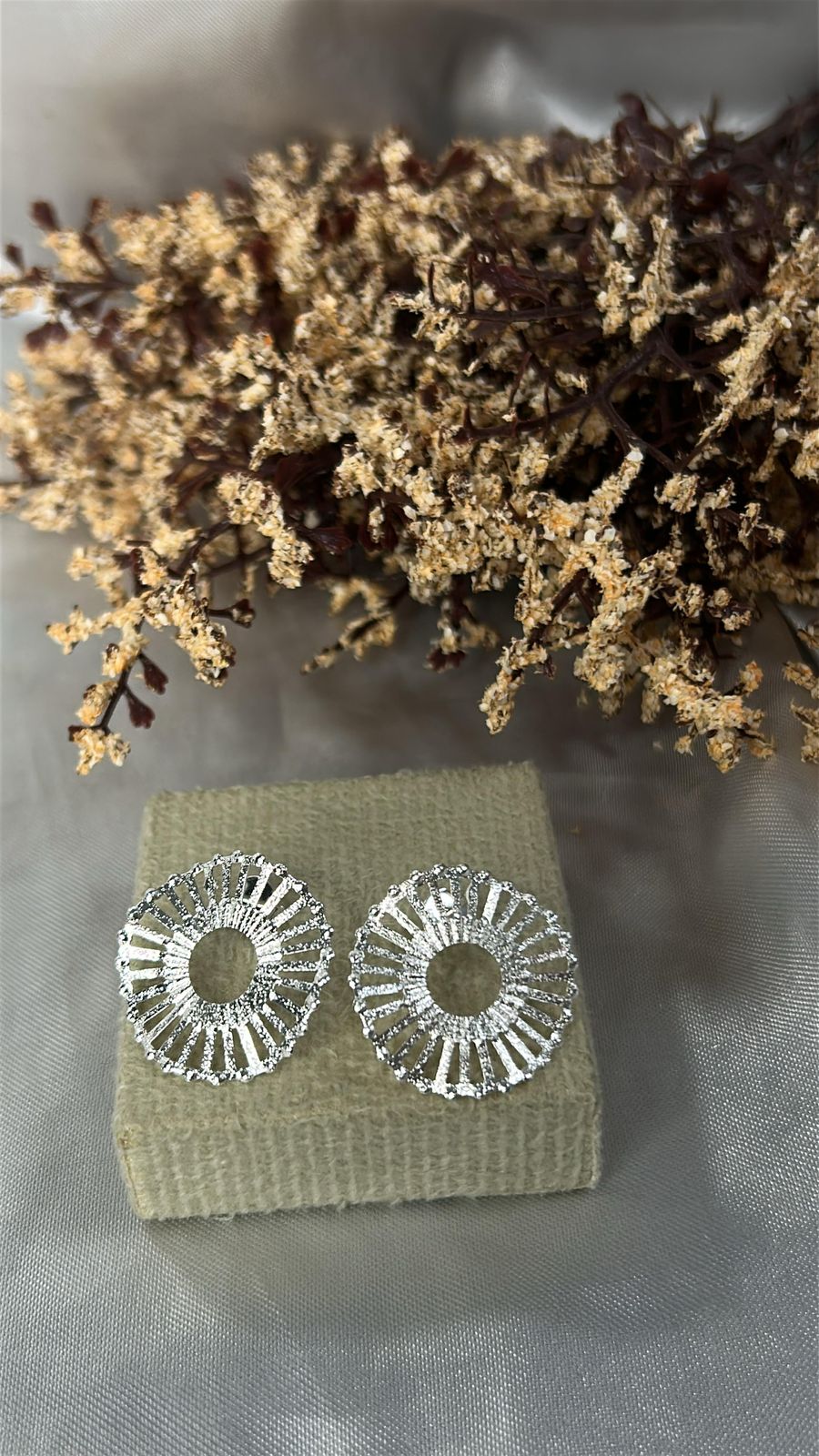 Brinco circulo ondulado