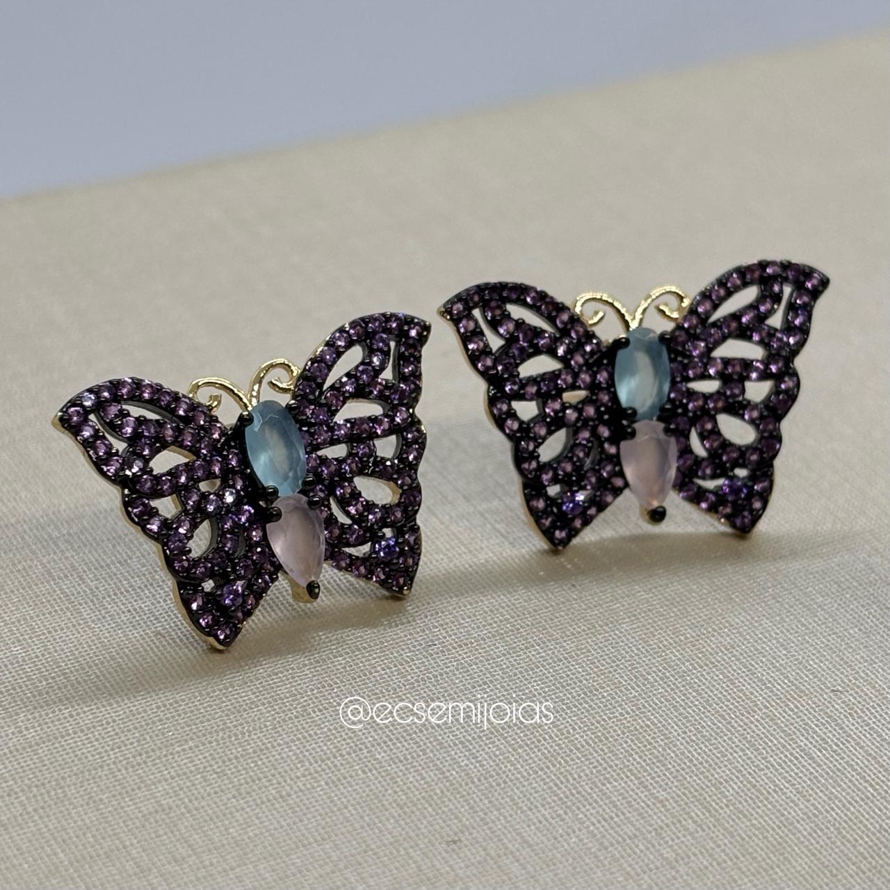 Conjunto de anel e brinco de borboleta com pedras maiores no centro e asas cravejadas - banhado a ouro 18k