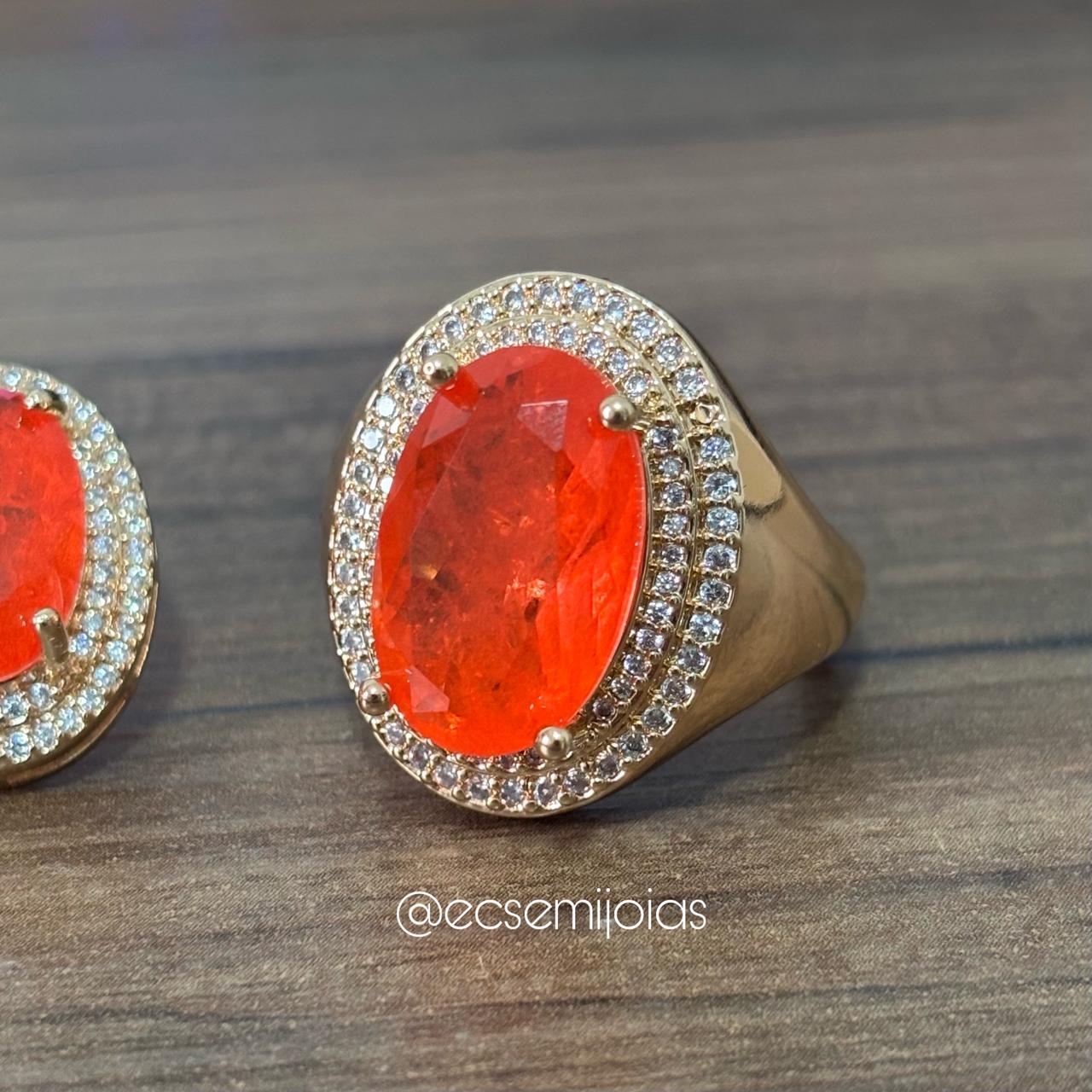 Conjunto de anel e brinco com pedra oval no centro cravejado em volta - banhado a ouro 18k