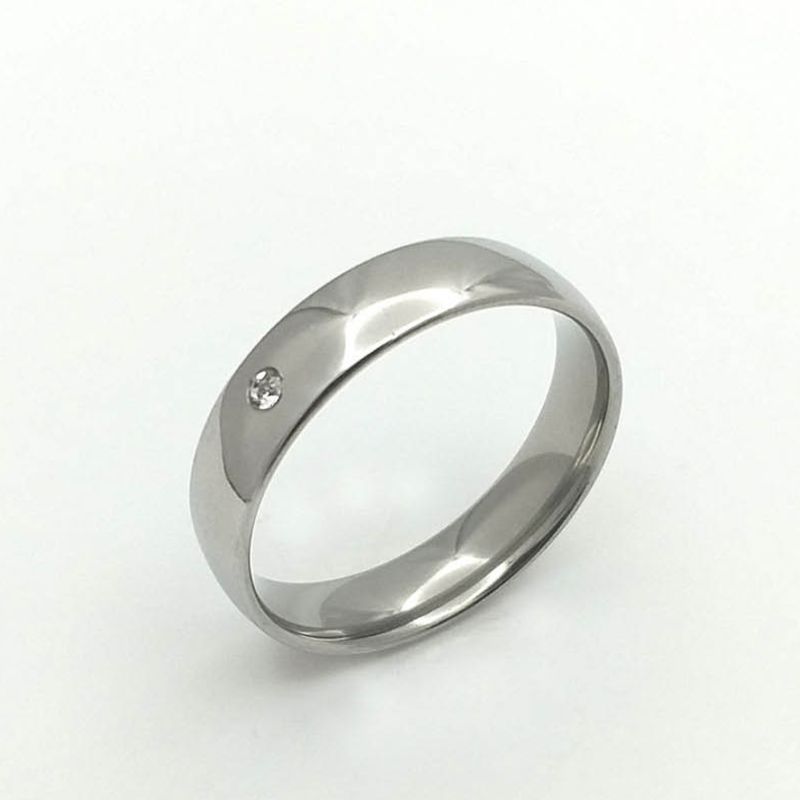 ANEL ALIANÇA AÇO INOX ANATÔMICA ABAULADA 6MM C/ 1 ZIRCONIA - Número 22/23