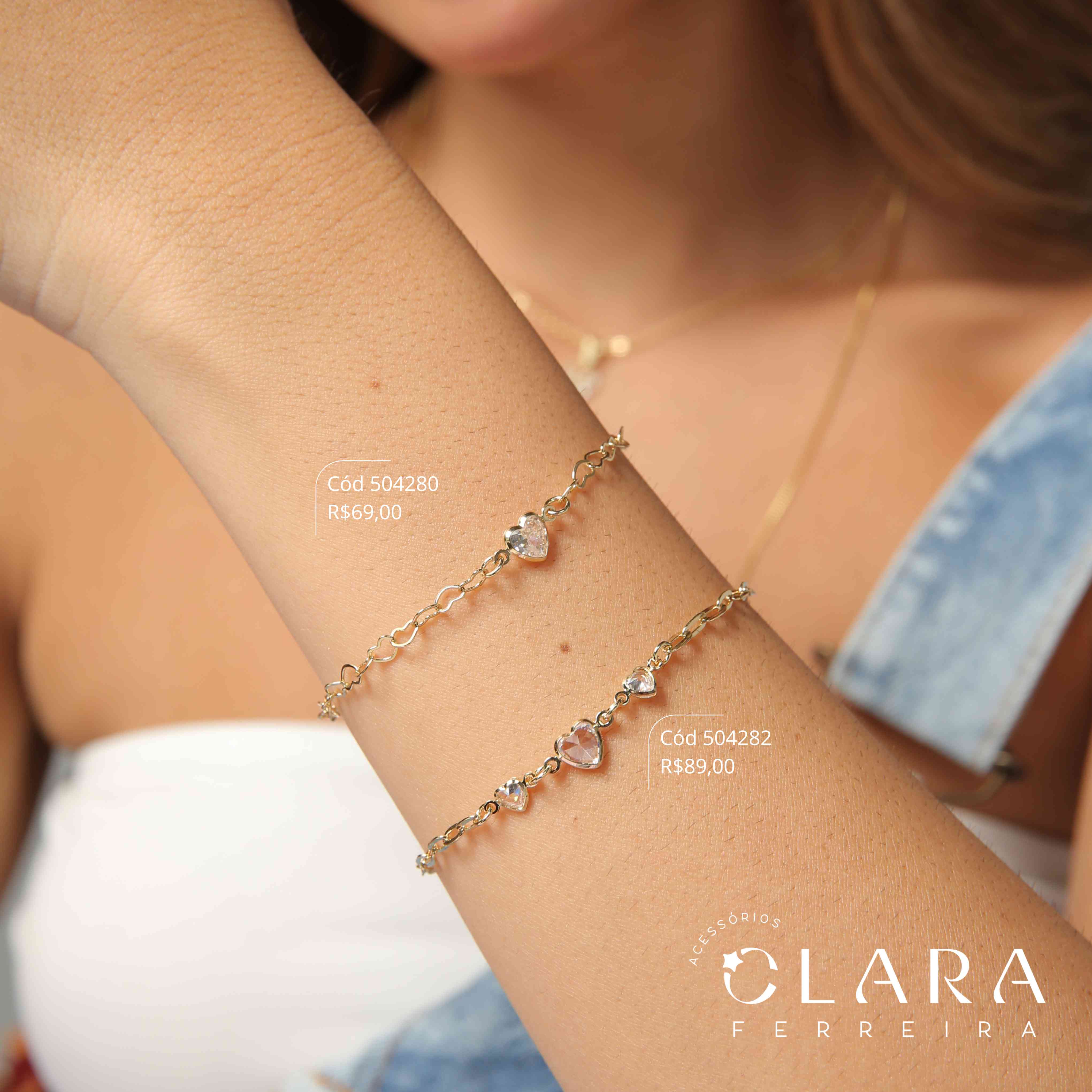 PULSEIRA ELOS CORAÇÕES ENTRELAÇADOS C/ 1 TIFFANY CORAÇÃO FIXA NO MEIO - 17CM - Dourado